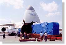 Loading oversized cargo into an airplane